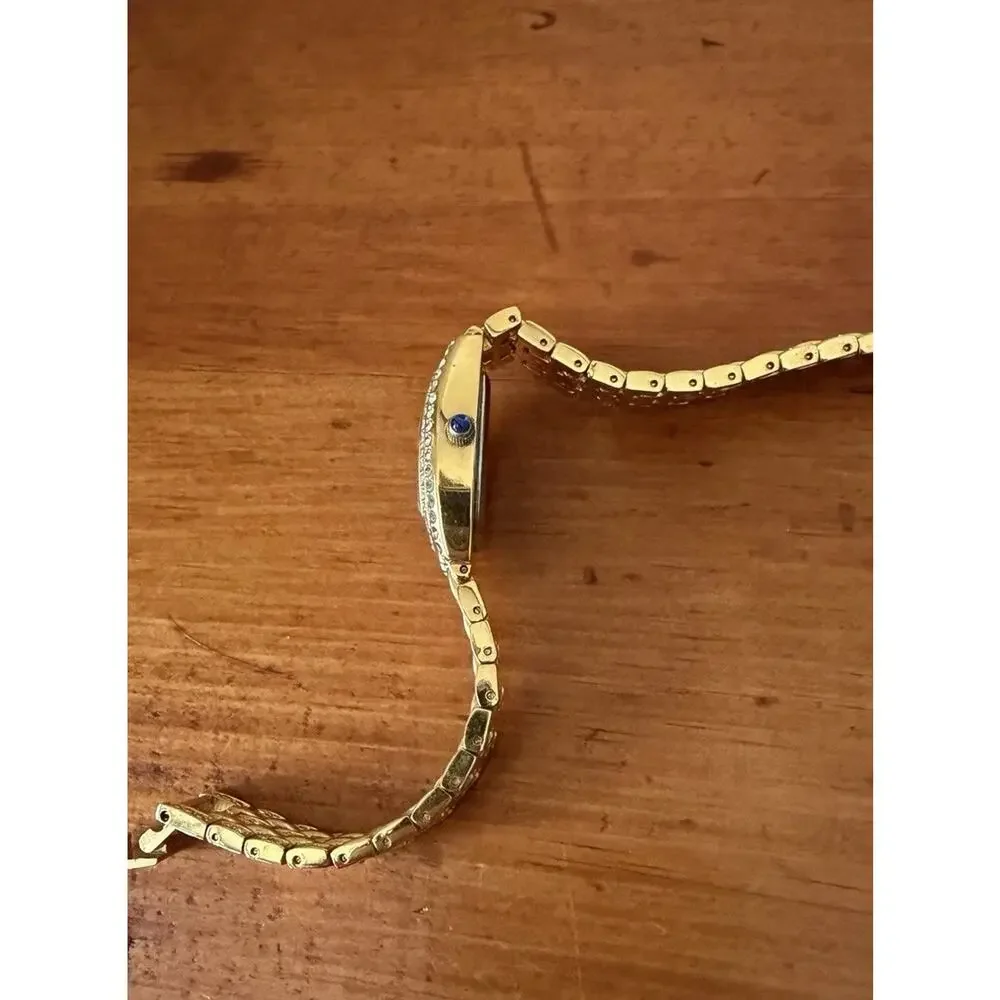 Nolan Miller Glamour Collection Crystal Gold Tone Bracelet Watch Mother Of Pearl